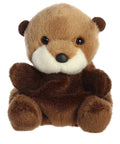 Plush toy otter on a white background