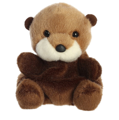 Plush toy otter on a white background