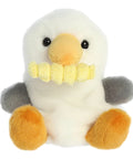 Plush toy penguin with a yellow beak on a white background