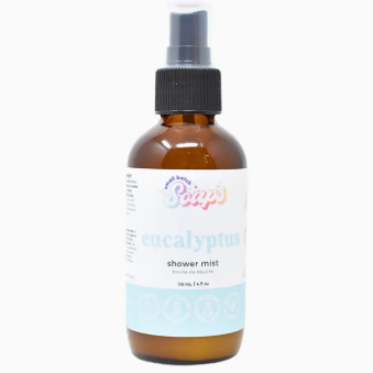 Bottle of eucalyptus shower mist on a white background