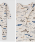 Two baby rompers with shark pattern on a light gray background