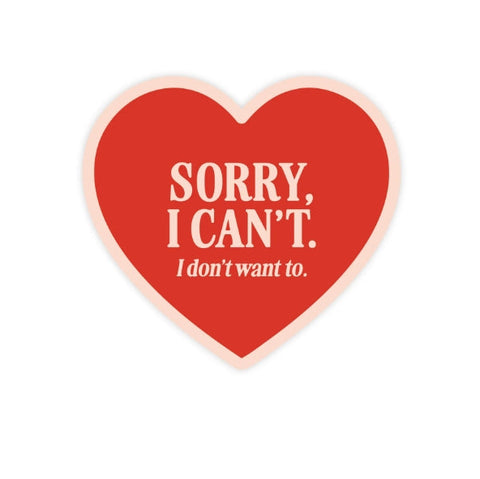 Red heart-shaped sticker with white text on a white background