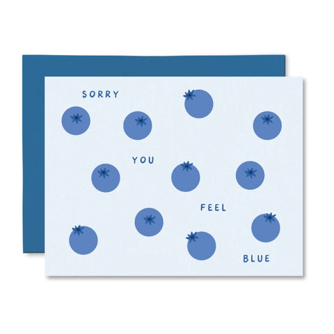 Card with blue circles and text 'Sorry you feel blue' on a white background