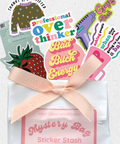 Mystery bag of stickers with colorful text and graphics on a white background