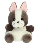 Plush toy dog with brown and white fur on a white background
