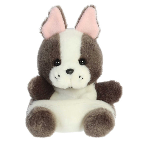 Plush toy dog with brown and white fur on a white background