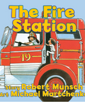 Book cover of 'The Fire Station' with a red fire truck and children on a blue background