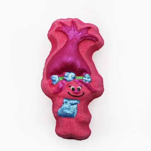 Pink toy with a smiling face and blue hair bow on a white background