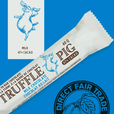 Pig Truffle milk chocolate bar with Direct Fair Trade logo on a blue background