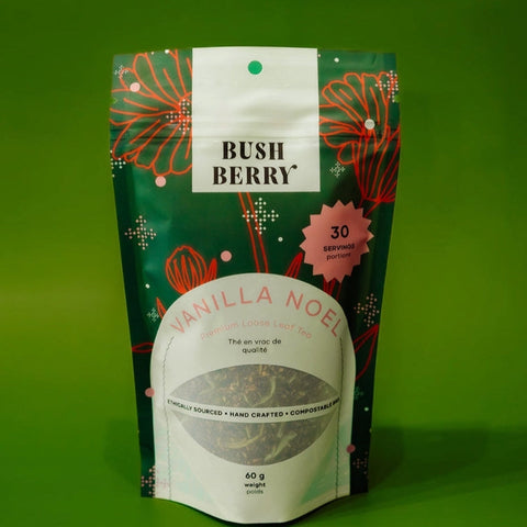Tea package with 'BUSH BERRY' branding on a green background