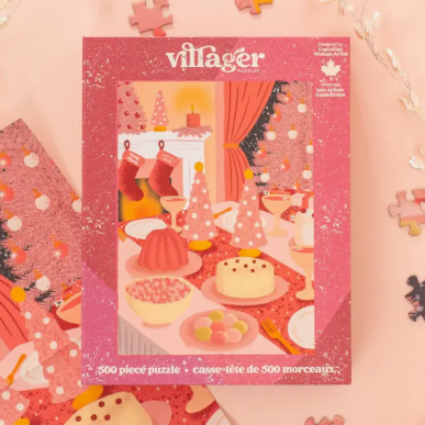 Villager 500 piece puzzle packaging with festive design on a pink background
