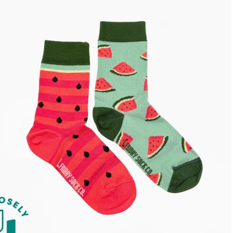 Two pairs of socks with watermelon designs on a white background