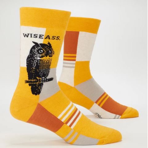 Pair of socks with owl design and 'WISE ASS.' text on a white background