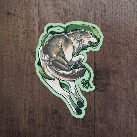 Sticker of a wolf on a wooden surface