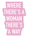 A pink die-cut sticker with white text reading 'WHERE THERE'S A WOMAN THERE'S A WAY' on a white background.