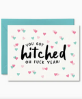 Card with 'You got hitched oh fuck yeah!' text and heart patterns on a white background