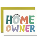 Greeting card with colorful text 'How cute you are a home owner' on a white background